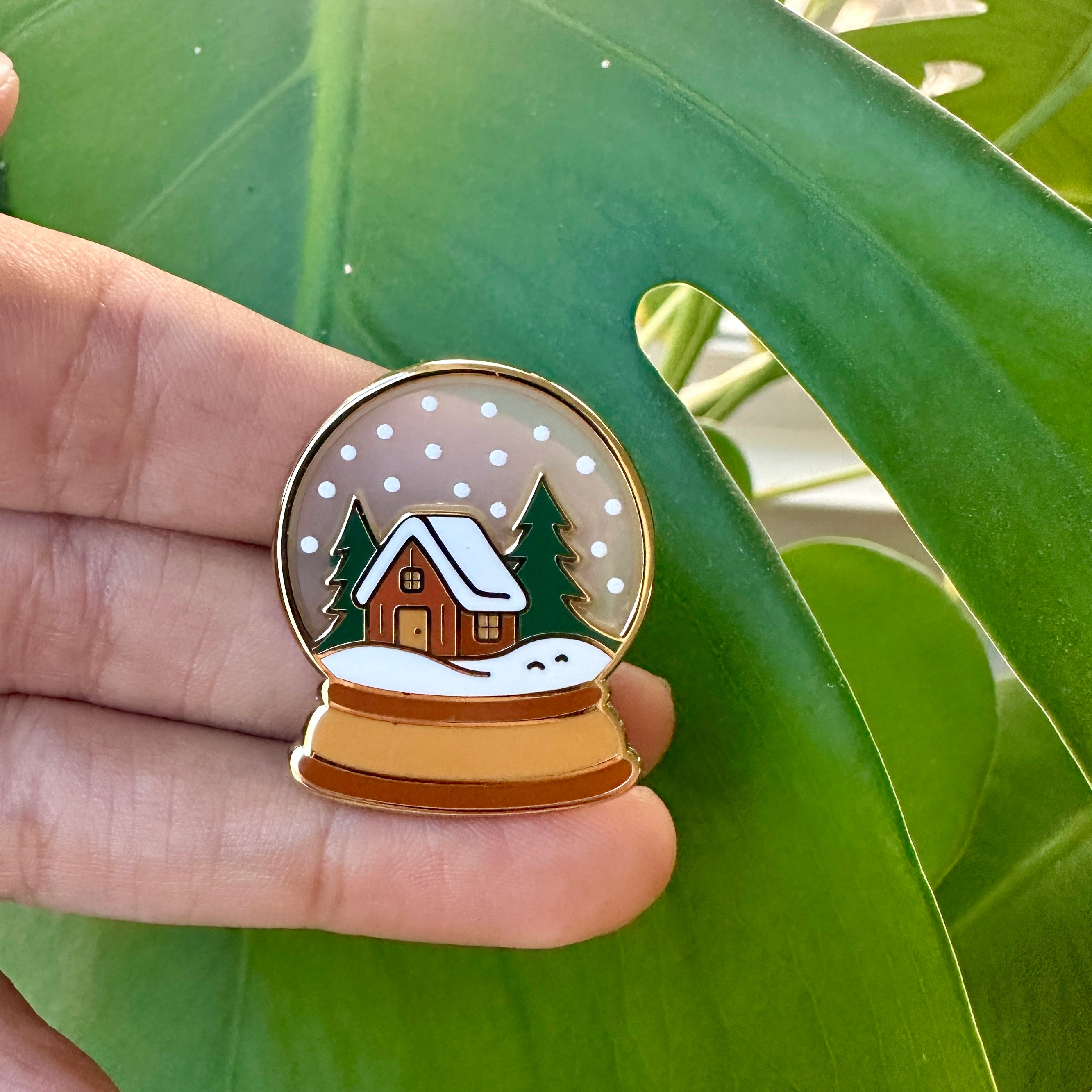 Snow Globe Enamel Pin with Cozy Cabin | Winter Holiday Lapel Pin | Christmas Snowy Cottage Badge | Cute Stocking Stuffer Gift