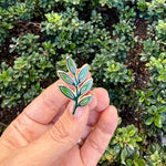Load image into Gallery viewer, Olive Branch Enamel Pin • Peace Symbol Lapel Pin • Green Olive Leaf Pin • Nature Lover Accessory for Jackets Bags Hats • Meaningful Gift Idea
