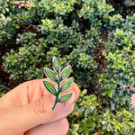 Load image into Gallery viewer, Olive Branch Enamel Pin • Peace Symbol Lapel Pin • Green Olive Leaf Pin • Nature Lover Accessory for Jackets Bags Hats • Meaningful Gift Idea
