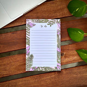 Botanical leaf to-do list notepad on wooden desk
