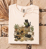 Load image into Gallery viewer, Cozy Book Cats Plants T-Shirt  Black Cat Reading Graphic Tee, Book Lover Shirt, Cat Mom Gift, Cottagecore Book Club Tee
